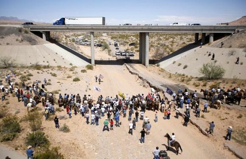 Protesters gather at the Bureau of Land Management's base camp near Bunkerville, Nevada